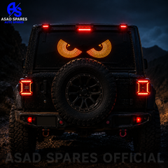 Semi-circle triangle LED Devil Eyes display glowing at night on vehicle rear glass for eye-catching road style