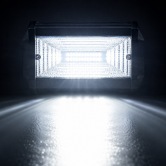 Dual LED work lamps producing bright wide beam lighting for improved nighttime driving and work visibility