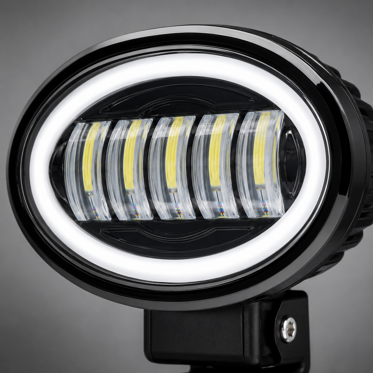 Close-up of oval five-eye LED headlight featuring durable housing and high-transmission projector lenses