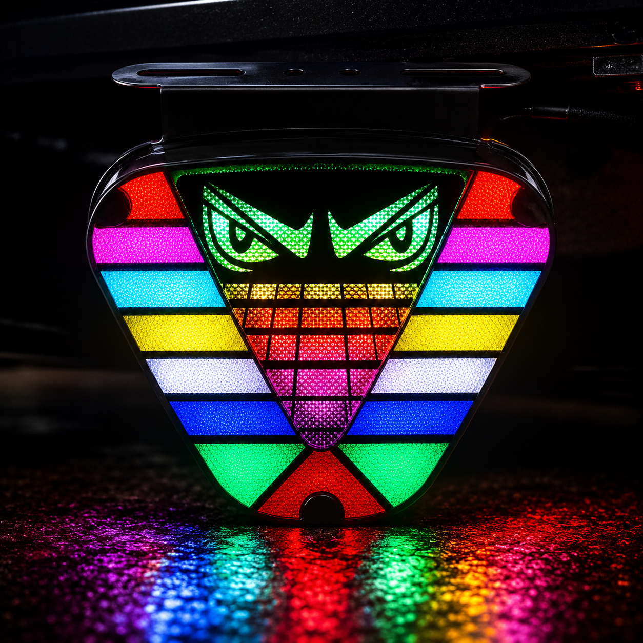 Multi-color rainbow LED brake light strip displaying dynamic navigation and flashing safety lighting effects on vehicle rear bumper